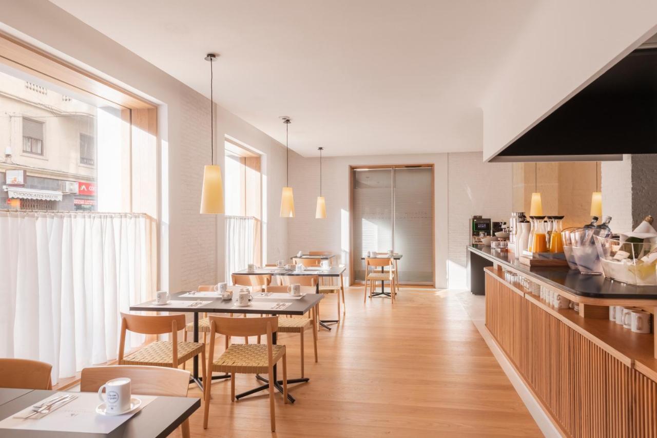 Eurostars Portico لقنت المظهر الخارجي الصورة Restaurant